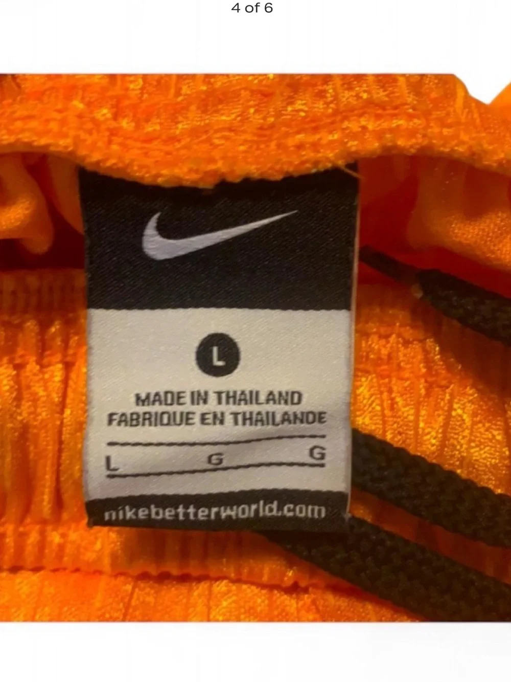 Nike Boy’s Orange Athletic Shorts with Gray Side Panels